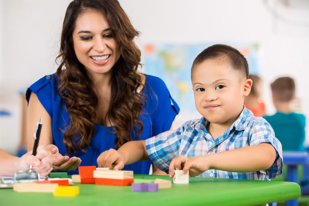 Smiling woman with a young boy